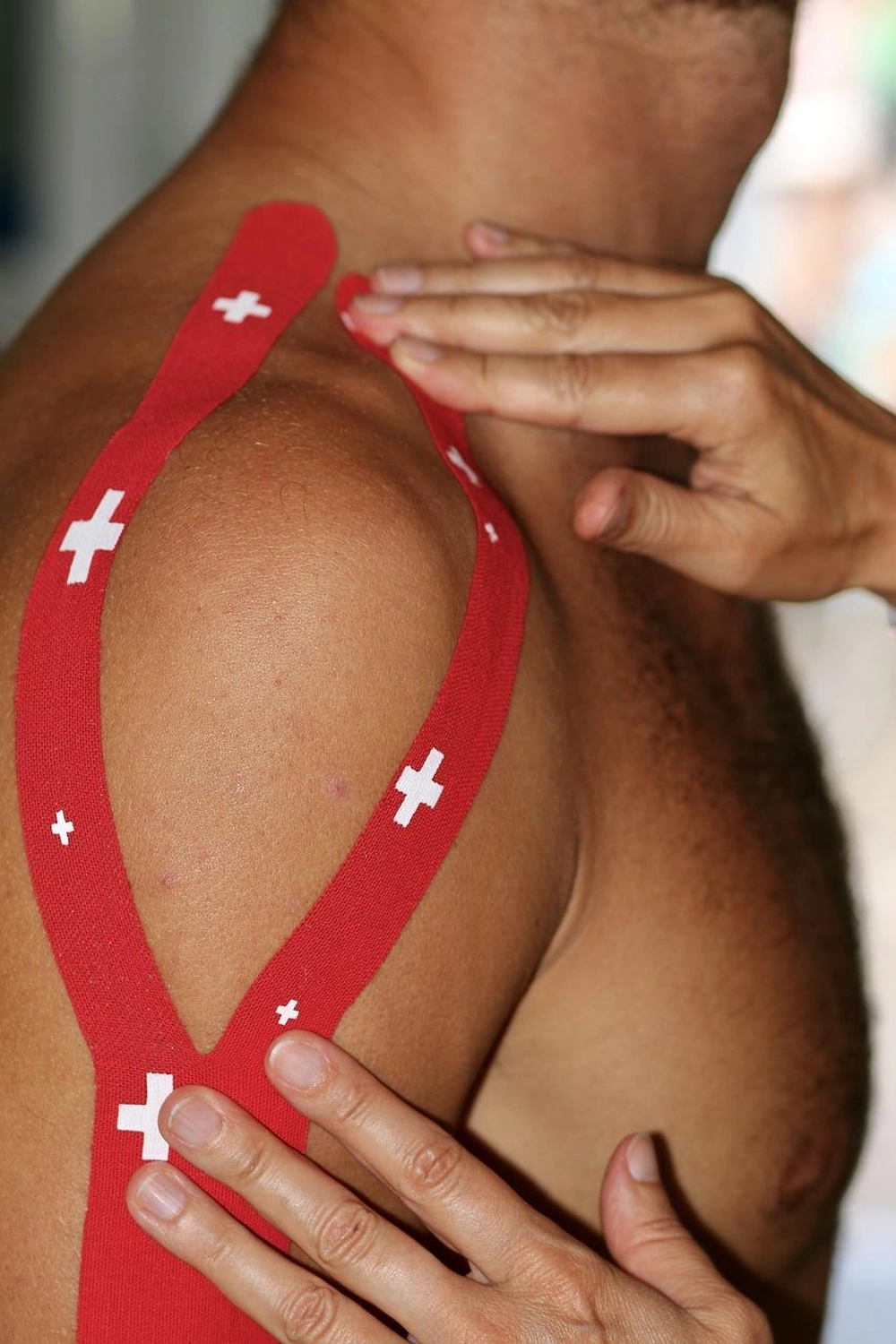Praxis für Ergotherapie - medizinisch-therapeutische Behandlung - Flextaping oder Kinesiotape an der Schulter